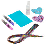 Shimmer 'n Sparkle Shimmering Metallic Hair Art includes two colored hair sprays, a bottle of hair spray, two heart-shaped hair clips with rhinestones, a blue hair extension, and a bundle of multicolored hair strands.