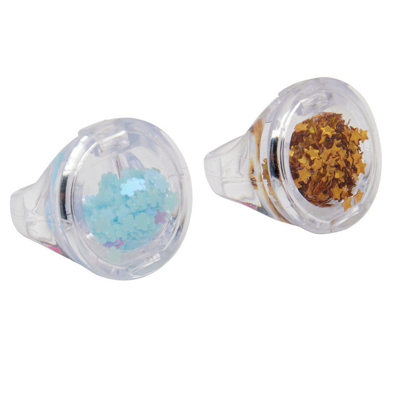 Two Shimmer 'n Sparkle Glitter & Gem Lip Gloss Lockets filled with decorative sequins: one with light blue star-shaped sequins, and the other with gold star-shaped sequins.