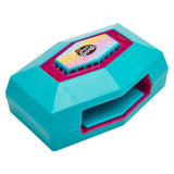 A teal and pink plastic toy with a label reading "Shimmer 'n Sparkle Ultimate Pedicure Party" on top. The object has a hexagonal shape and an opening at the front.