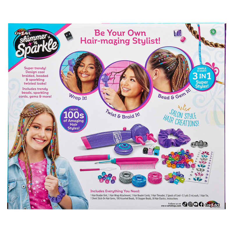 Box for “Shimmer 'n Sparkle BRAID & WRAP HAIR DESIGNER” styling kit. Features images of a girl with styled hair and tools for wrapping, twisting, beading, and gemming hair. Includes list of contents and style ideas.