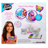 Packaging for "Shimmer 'n Sparkle Cra-Z-Squeezies Color Your Own Squeezie Fun" featuring a girl holding a colored squishy toy. Box includes uncolored toys, markers, and instructions for creating slow rising squishy toys.