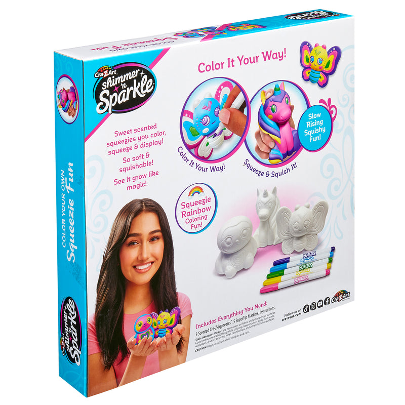 Box for "Shimmer 'n Sparkle Cra-Z-Squeezies Color Your Own Squeezie Fun," a DIY craft kit with slow-rising squishy animals to color. Features a girl holding a decorated squishy, markers, and images of completed designs.