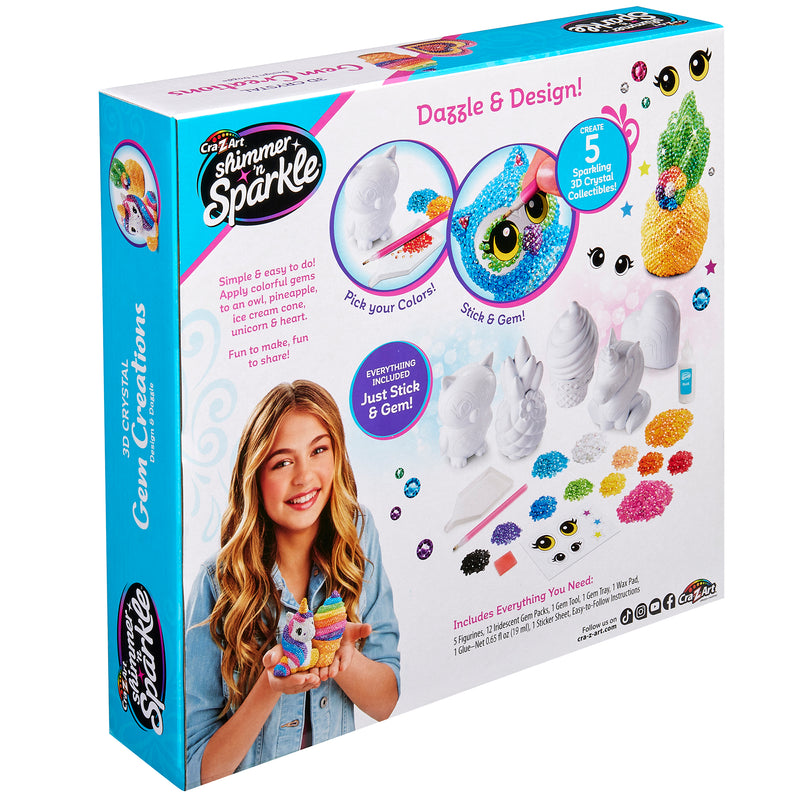 Colorful Shimmer 'n Sparkle 3D Crystal Gem Creations packaging showing girl holding decorated figurines. Features five sparkling 3D crystal creations and includes all materials needed. Instructions and embellishments displayed.