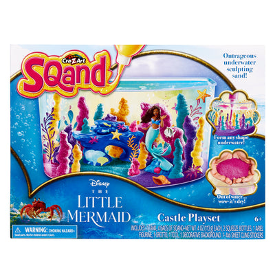 The image shows a The Little Mermaid Sqand Castle Playset based on Disney's "The Little Mermaid." The packaging displays the contents and features like underwater sculpting sand. The set is for ages 6 and up.