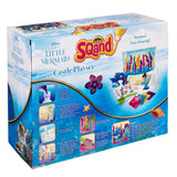 Packaging of The Little Mermaid Sqand Castle Playset. The box shows components, features, and instructions for creating underwater sand art scenes with included tools and molds.