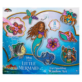 The image shows a "The Little Mermaid 2 in 1 Window Set" with 8 sun catcher designs that include mermaid, flower, fish, sea star, crab, seahorse, shell, and king figure.