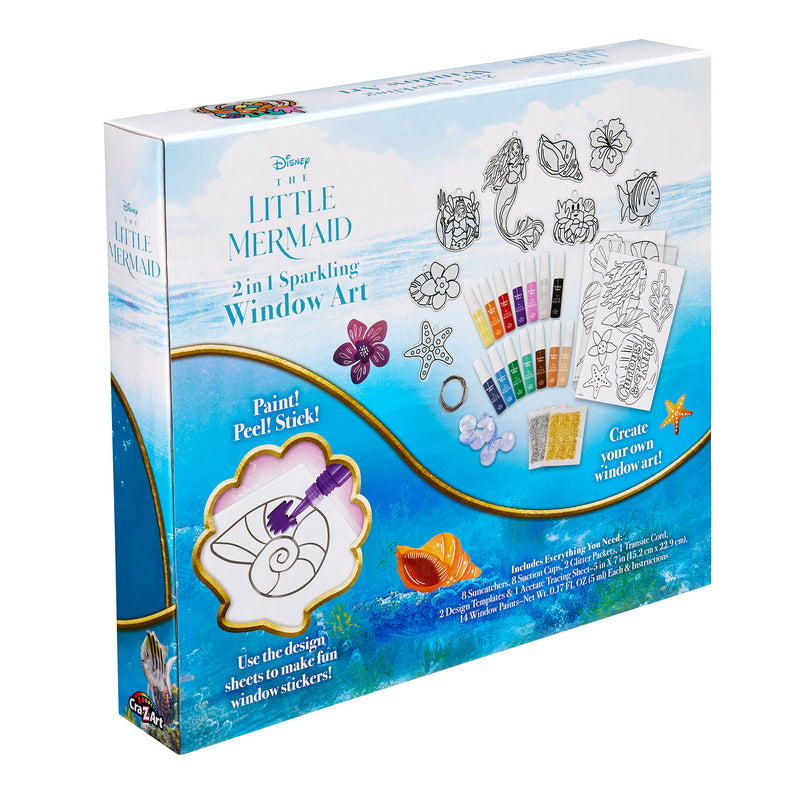 A Disney-themed "The Little Mermaid 2 in 1 Window Set," featuring materials for painting and creating window stickers, displayed against a decorative ocean-themed backdrop.