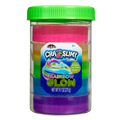 A container of Cra-Z-Slimy Glow Slimy Jar with a green lid, showcasing six colorful layers. Label reads "Glows in the Dark!" and "Net Wt. 9.7 oz (275 g). For ages 6+.
