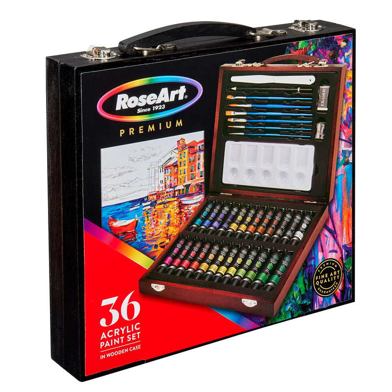 RoseArt Premium Wooden Box ACRYLIC PAINT ART SET 36 Count, featuring paint tubes, brushes, palette, and accessories, displayed on a colorful packaging with an easel painting graphic.