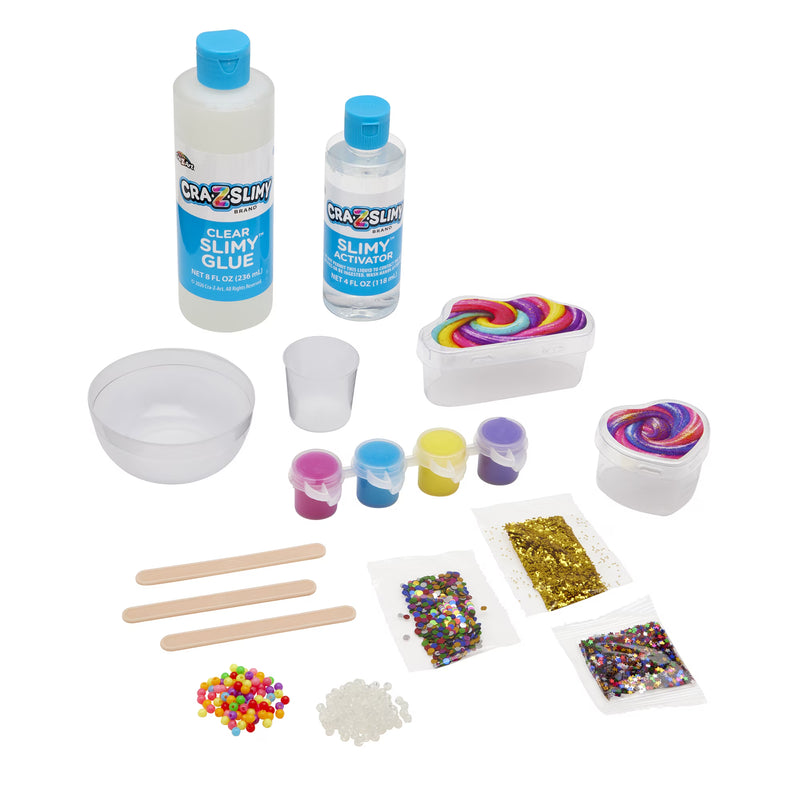 Cra-Z-Slimy DIY Super Slimy Shoppe make-your-own slime kit out of package with clear slime glue, activator, pink, blue, yellow and purple colors, confetti, beads, and slime-making supplies.