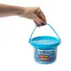 Hand holding the blue carrying handle of a Cra-Z-Art Cra-Z-Slimy New Wave Metallic Slime 24 oz tub, showing its convenient portable packaging.