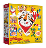 A RoseArt - Kellogg's 12 Multi-Shaped - Kellogg's - 500 Piece Jigsaw Puzzle box features 12 multi-shaped, cereal-themed puzzles totaling 500 pieces. Front showcases cartoon mascots and colorful imagery of different Kellogg's cereal characters.