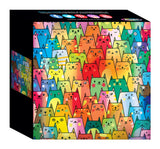 A cube-shaped box featuring a colorful, repeating pattern of cartoon cat faces in various colors and designs contains the RoseArt - Rose - Cute Colorful Cats - 1000 Piece Jigsaw Puzzle.
