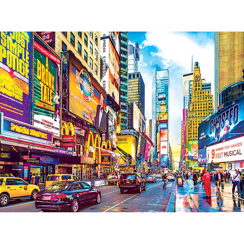 Brightly lit Times Square with numerous billboards, yellow taxis, and pedestrians. Various advertisements for musicals, films, and branded stores are prominently displayed on the RoseArt - Kodak Premium - Times Square & 7th Avenue, Manhattan, NY - 1000 Piece Jigsaw Puzzle.