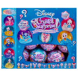The Disney Crystal Surprise Color Change Ball toy set is packaged in vibrant packaging and includes various toys and mystery items.