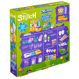 Back of a Stitch Slime Studio kit box shows included items, step-by-step instructions, and product images on a bold green and purple background.