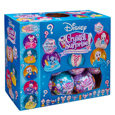 The Disney Crystal Surprise Color Change Ball features vibrant packaging adorned with images of collectible characters and question marks, emphasizing a surprise mix and play activity theme. Discover the magic of color change as you reveal each captivating surprise.