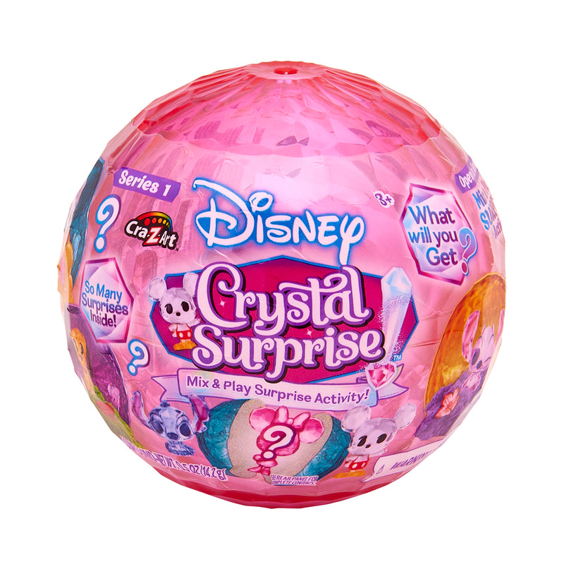 The Disney Crystal Surprise Color Change Ball is packaged in a pink spherical container embellished with inviting phrases, question marks, and a touch of magical color change, offering an exciting mystery inside.